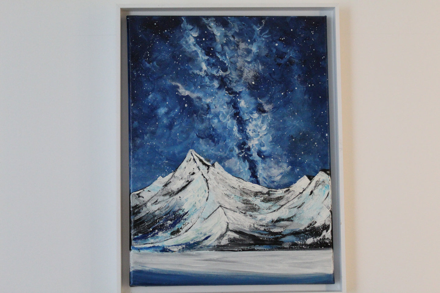 Snony mountain on a milky way night