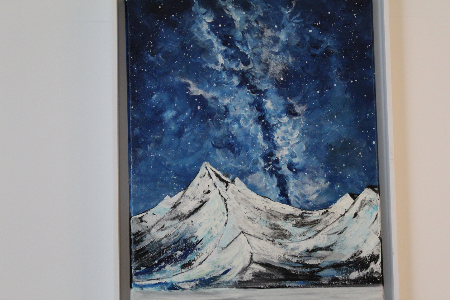 Snony mountain on a milky way night