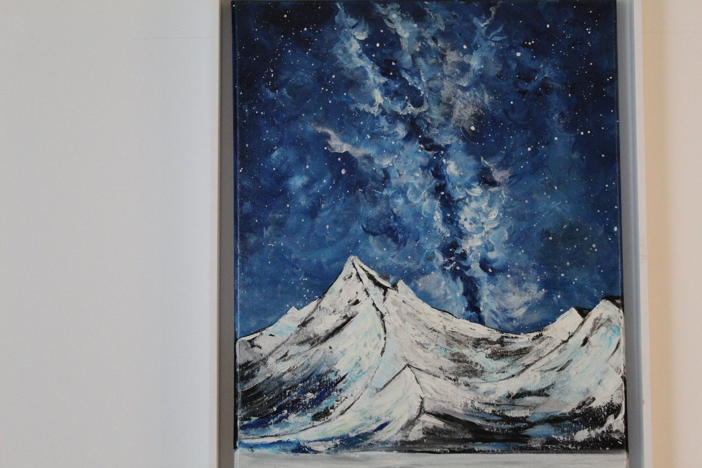 Snony mountain on a milky way night