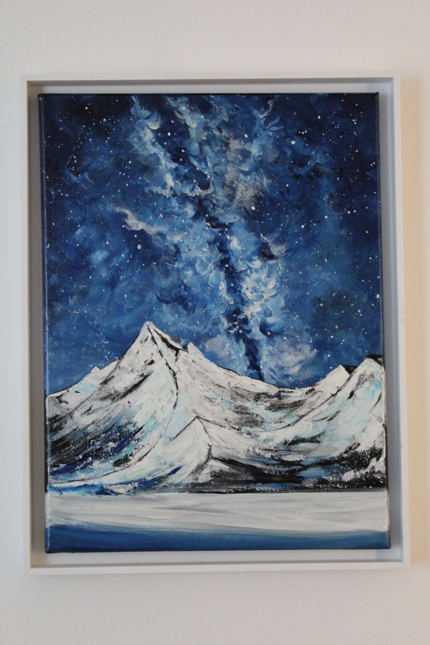 Snony mountain on a milky way night