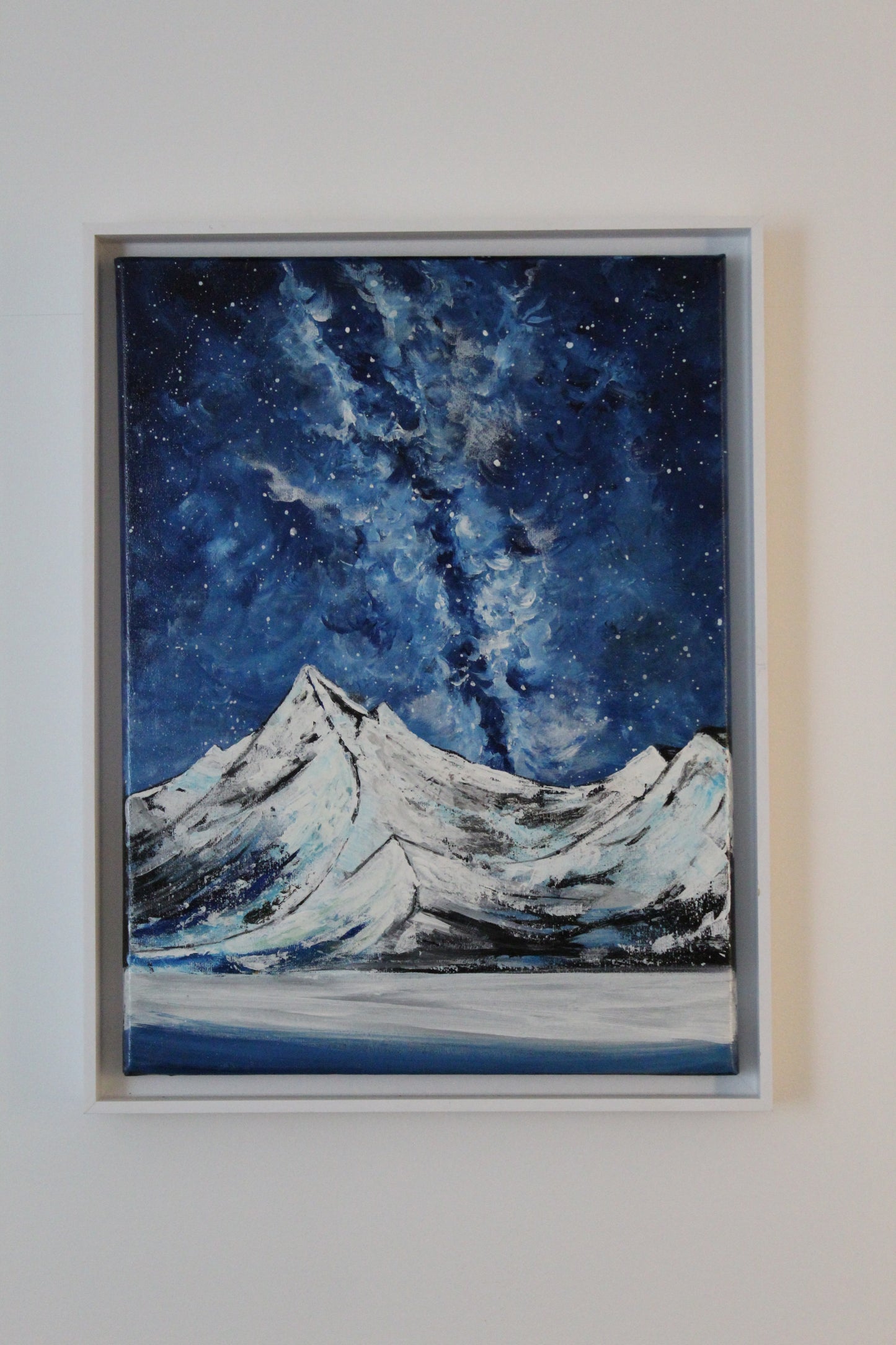 Snony mountain on a milky way night